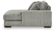Ashley Furniture Lindyn sectional with chaise, featuring plush upholstery and modern design, shown in a spacious living room setting.