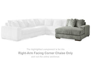 Ashley Furniture Lindyn sectional with chaise, beige fabric sofa featuring plush cushions and wide armrests.