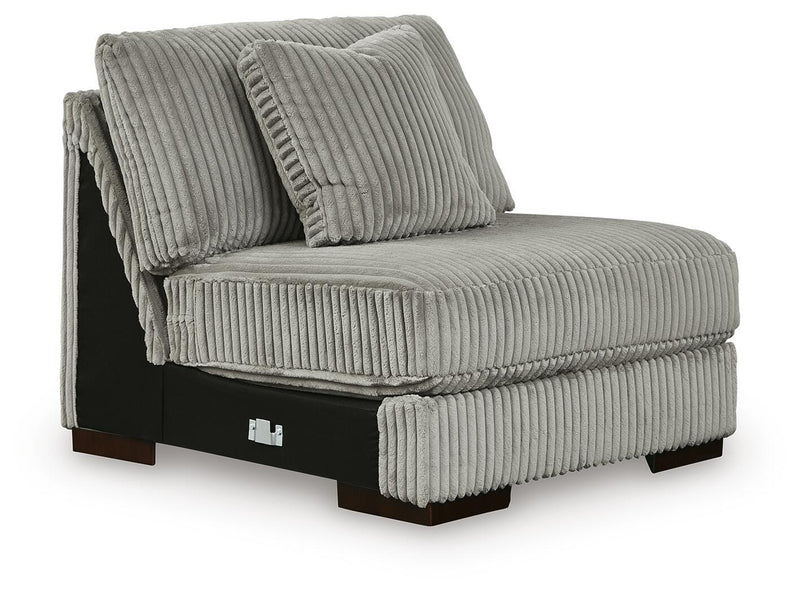 Ashley Furniture Lindyn sectional with chaise, featuring plush fabric upholstery and modern design, shown in an angled view.