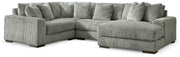 Ashley Furniture Lindyn sectional with chaise, showing a modern fabric sofa with multiple cushions and a spacious design