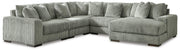 Ashley Furniture Lindyn sectional with chaise, showing plush fabric upholstery and modern design in a spacious living room setting.