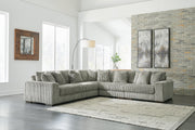 Ashley Furniture Lindyn living room set with sofa, loveseat, and coffee table arranged in a modern, stylish living space.