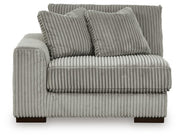Ashley Furniture Lindyn sectional with chaise, featuring plush cushions and modern design, shown head-on from the front.
