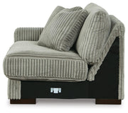 Ashley Furniture Lindyn sectional with chaise, showing plush fabric upholstery and modern living room setting.