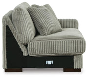 Ashley Furniture Lindyn sectional with chaise, featuring plush fabric, modern design, and comfortable seating arrangement.