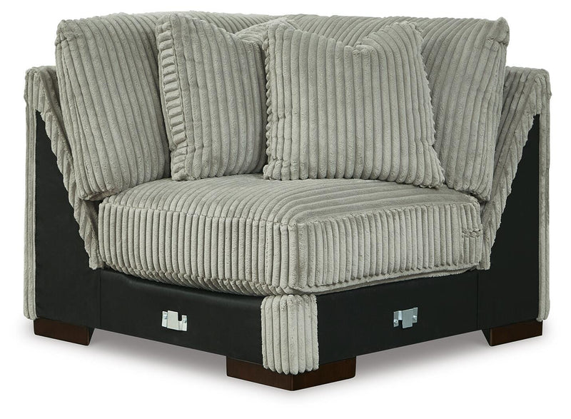 Ashley Furniture Lindyn sectional with chaise, showcasing a modern fabric sofa with a chaise lounge in neutral tones.