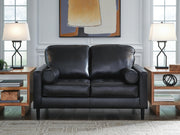 Ashley Furniture Bryceview loveseat with plush fabric and cushioned arms, perfect for a cozy living room seating area.
