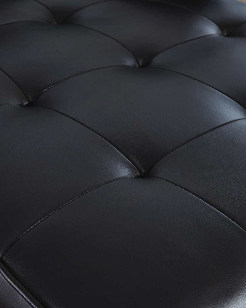 Ashley Furniture Bryceview Loveseat in textured upholstery, showing plush cushions and stylish armrests for comfortable seating.