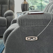Ashley Furniture Observation Power Reclining Sofa with drop-down table, featuring built-in USB ports and plush upholstery.