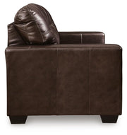 Ashley Furniture Santorine loveseat with plush beige fabric and cushioned armrests, perfect for cozy living room seating.