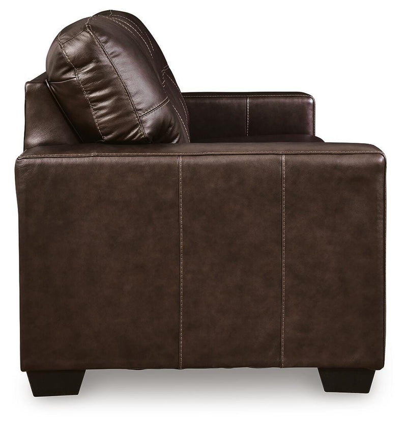 Ashley Furniture Santorine sofa sleeper with side view, showing its stylish design and convertible sleeper feature.