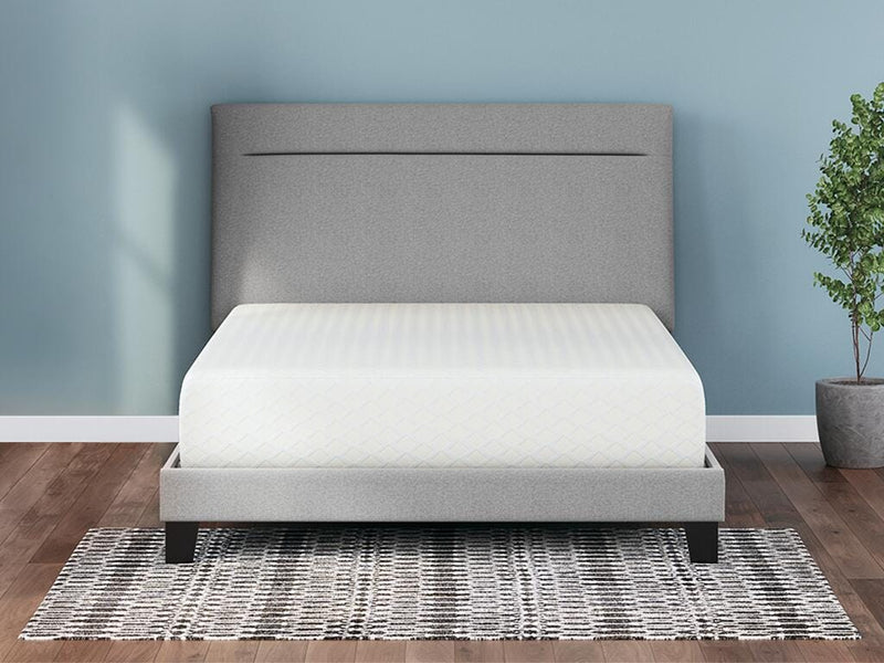 Ashley Furniture Chime 12-inch memory foam mattress in a box, showcasing the plush, white memory foam surface and packaging.