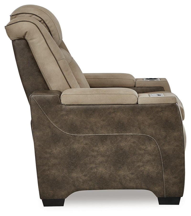 Ashley Furniture Next-Gen DuraPella Power Recliner showing plush fabric upholstery, padded armrests, and reclining mechanism.
