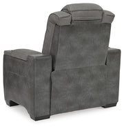Ashley Furniture Next-Gen DuraPella Power Recliner with plush fabric and built-in recline mechanism, shown from the back with detailed stitching.