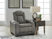 Ashley Furniture Next-Gen DuraPella Power Recliner in dark gray fabric, showing the closed reclined position with plush cushioning.