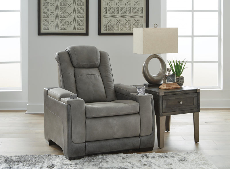 Ashley Furniture Next-Gen DuraPella Power Recliner in dark gray fabric, showing the closed reclined position with plush cushioning.