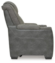 Ashley Furniture Next-Gen DuraPella power recliner with plush upholstery and padded armrests, shown from the side view.