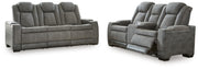 Ashley Furniture Next-Gen DuraPella Living Room Set with plush sofas and coordinated armchair in a modern design.