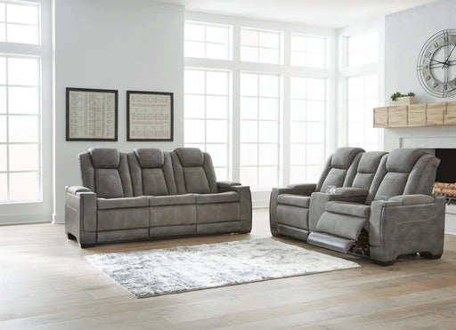 Ashley Furniture Next-Gen DuraPella living room set featuring a sofa and armchair with modern upholstery and stylish design.