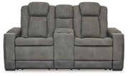 Ashley Furniture Next-Gen DuraPella power reclining loveseat with console, showcasing plush fabric, reclining seats, and built-in cup holders.