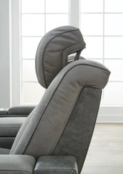 Ashley Furniture Next-Gen DuraPella power reclining loveseat with console, featuring plush upholstery and built-in cup holders.