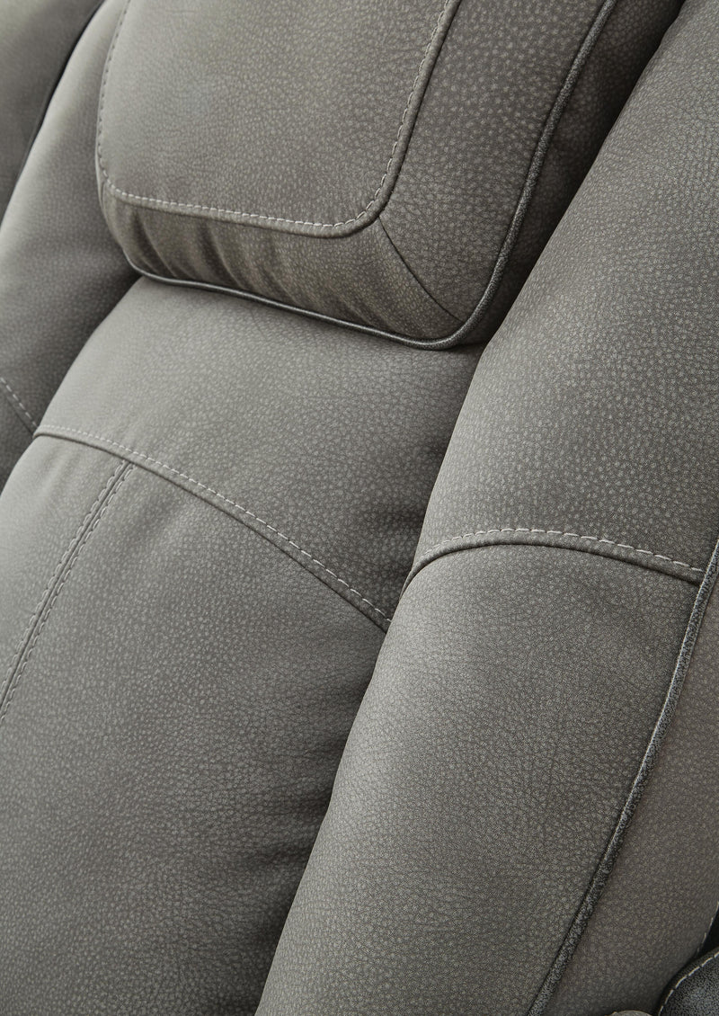 Close-up of the stitching detail on the fabric upholstery of the Ashley Furniture Next-Gen DuraPella Power Recliner.