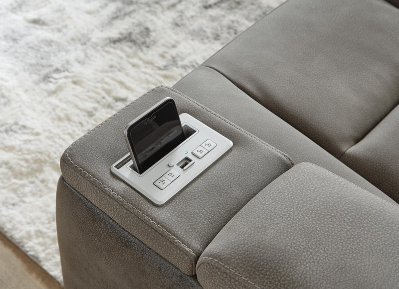 Ashley Furniture Next-Gen DuraPella Living Room Set with sofa, armchair, and coffee table in a modern living space.