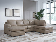 Ashley Furniture Amuleto sectional sofa with chaise, featuring plush cushions and modern design in a cozy living room setting.