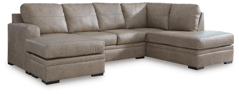 Ashley Furniture Amuleto sectional with chaise, featuring plush fabric and modern design, shown in a cozy living room setting.