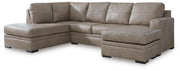 Ashley Furniture Amuleto sectional with chaise, featuring plush cushions and modern design in a cozy living room setting.