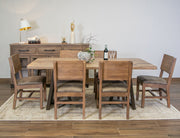 Natural Parota dining table from International Furniture Direct showing a rustic wooden tabletop and sturdy legs.