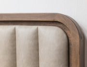Mezquite upholstered queen bed by International Furniture Direct with a padded headboard and wooden frame in a bedroom setting.