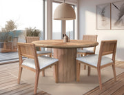 Giza round dining table by International Furniture Direct with wooden surface and sturdy legs, ideal for family dining rooms.