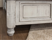 King size stone bed by International Furniture Direct featuring a sturdy stone-textured frame and elegant headboard design.