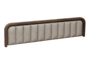 Upholstered queen bed from International Furniture Direct featuring a cushioned headboard and wooden frame in a modern design.