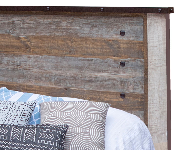 Antique King Bed by International Furniture Direct featuring carved wood details and classic design in a rustic finish.