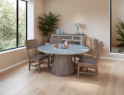 Sahara round dining table by International Furniture Direct with a wooden surface and sturdy legs, ideal for kitchen or dining room.
