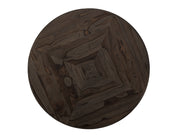Black Balam round dining table by International Furniture Direct, featuring a smooth tabletop and sturdy wooden legs.