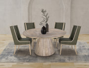 White Balam round dining table by International Furniture Direct, showcasing its smooth surface and sturdy wooden legs.