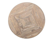 White Balam round dining table by International Furniture Direct, showing the smooth surface and sturdy wooden legs.