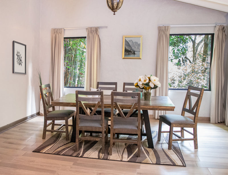 Loft brown dining table by International Furniture Direct with a sturdy wooden surface and modern design for dining rooms.