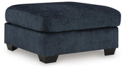 Ashley Furniture Aviemore oversized accent ottoman in neutral fabric, showing its large, plush surface and stylish design.