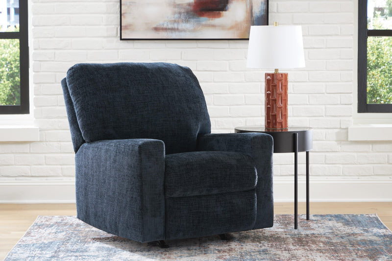 Ashley Furniture Aviemore recliner in dark brown leather with plush cushioning and a modern design.