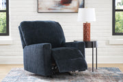 Open Ashley Furniture Aviemore recliner in plush fabric with padded armrests and a comfortable design.