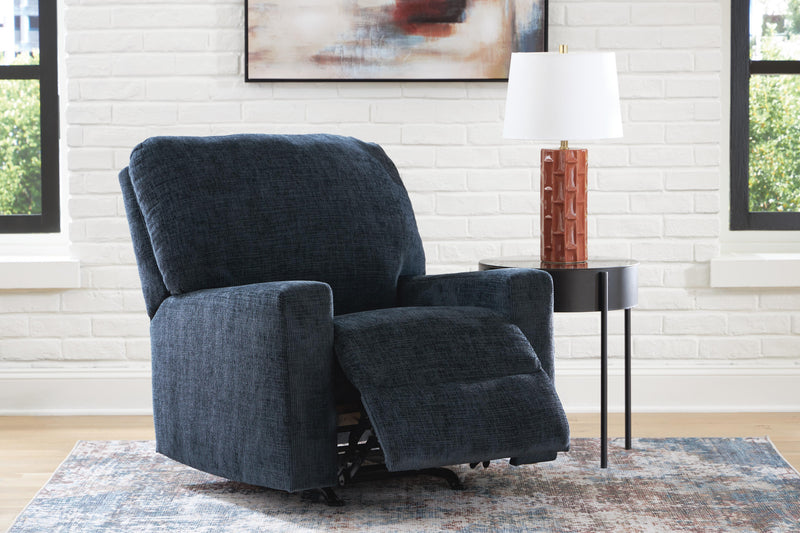 Open Ashley Furniture Aviemore recliner in plush fabric with padded armrests and a comfortable design.