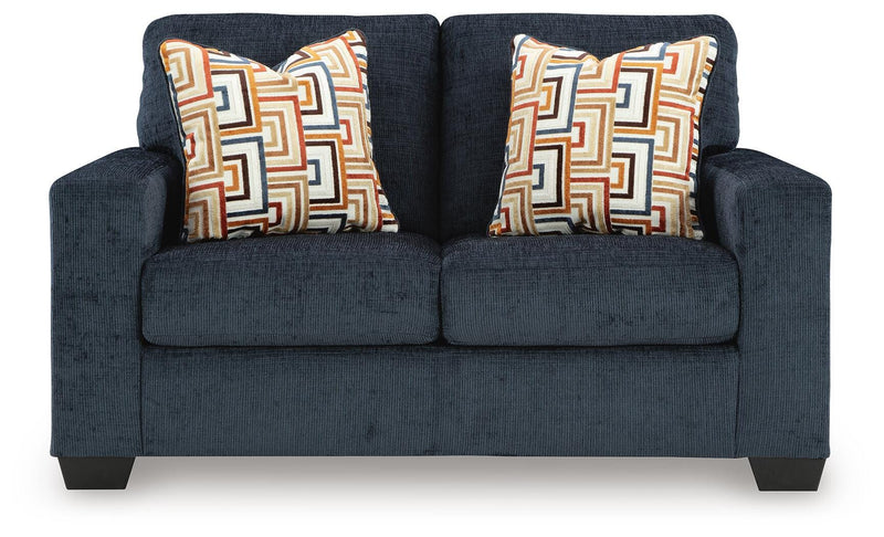 Ashley Furniture Aviemore loveseat with plush cushions and soft upholstery, shown from a head-on view.