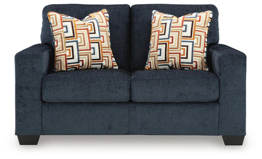 Ashley Furniture Aviemore loveseat with plush cushions and soft upholstery, shown from a head-on view.