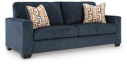 Ashley Furniture Aviemore Sofa Sleeper with plush fabric, angled view showing the sofa with a pull-out bed feature.