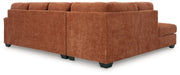 Ashley Furniture Aviemore sectional with chaise, showing the back view of the fabric upholstered sectional with cushioned backrests.