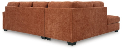 Ashley Furniture Aviemore sectional with chaise, showing the back view of the fabric upholstered sectional with cushioned backrests.